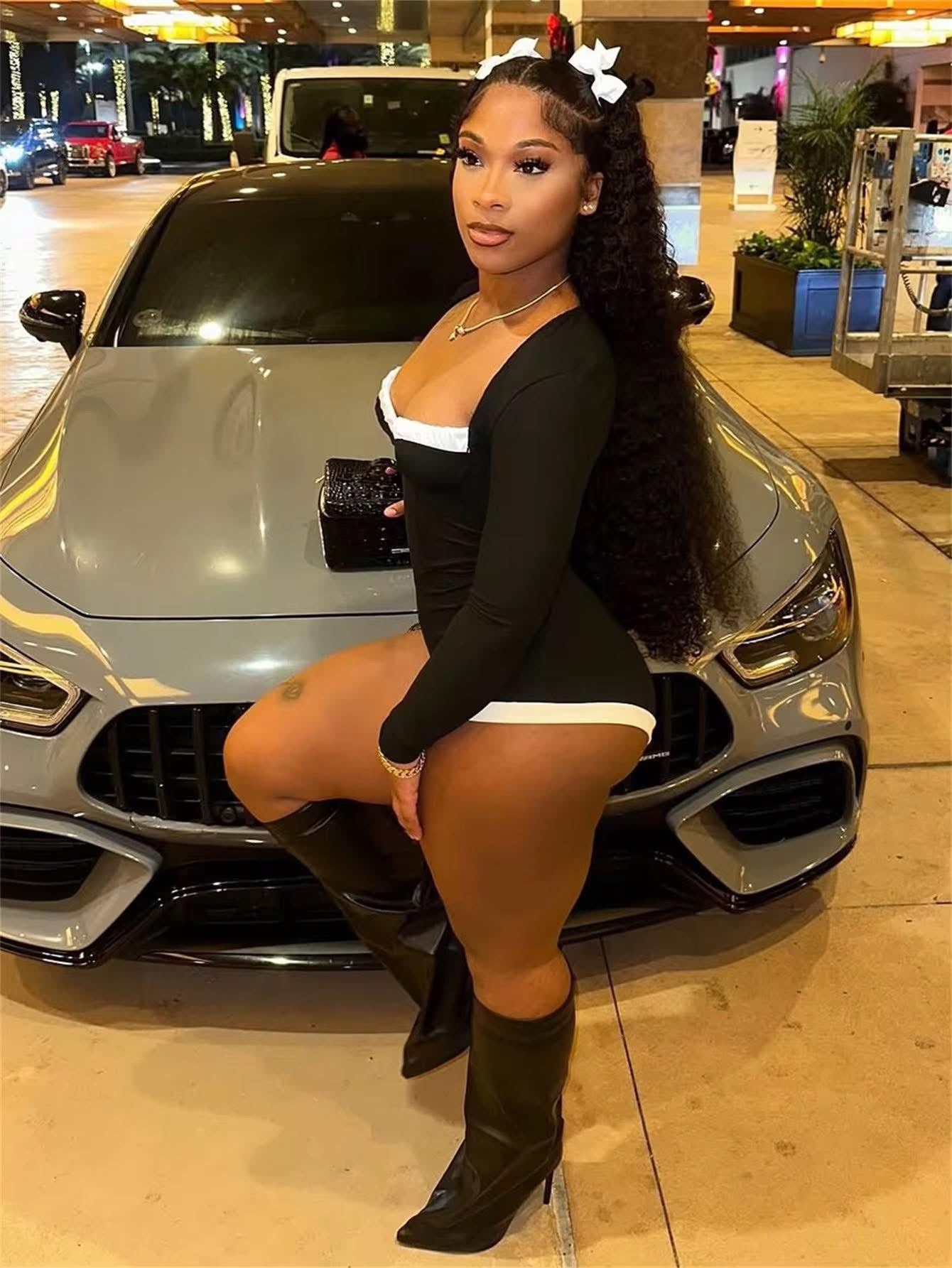 “Call Me Gorgeous” long sleeved black romper