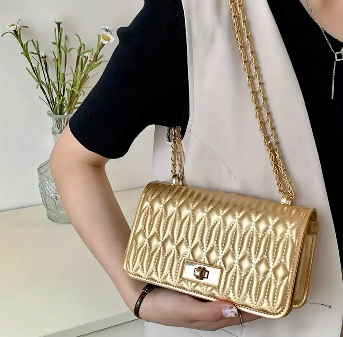 “A Queens Palace” gold handbag